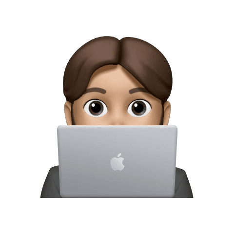 Person peeking from behind laptop